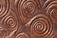 A textured surface with swirling patterns Product Image 1