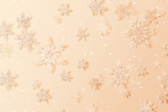 A peach-colored background with white and gold snowflakes Product Image 1
