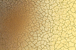 A cracked and dry earth surface with a gradient of brown Product Image 1