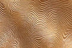A textured gold surface with wavy lines Product Image 1