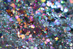 Multicolored glitter scattered on a surface Product Image 1