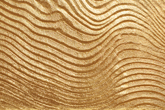 A textured golden surface with wavy lines Product Image 1