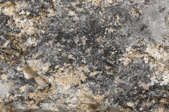 A textured granite stone surface Product Image 1