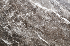 A gray marble surface with white veins Product Image 1