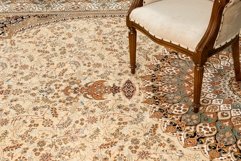 Antique chair on a the decorated oriental carpet Product Image 1