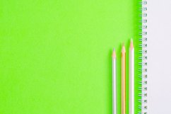 School and office supplies on office table, green background Product Image 1