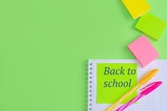 School and office supplies on office table, green background Product Image 1