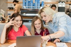 Smiling woman holding a meeting with different classmates Product Image 1