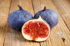 Figs on wooden background Product Image 1