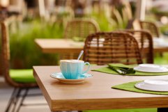Morning coffee on a cozy cafe terrace. Product Image 1