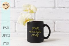 Black coffee mug mockup with soft yellow orchid Product Image 1