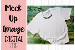 White Short Sleeve Tee Shirt on Green Bricks Mock Up Product Image 1