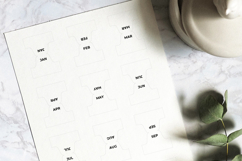 Monthly divider tabs stickers in A5 for planner organization. Printable PDF files with minimalist design for bullet journals and calendars.  