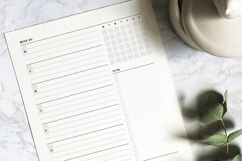Printable A5 weekly planner template featuring undated one-page layout with to-do list, daily schedule blocks and notes section for efficient weekly organization.