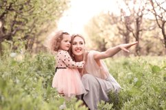Mother with daughter outdoors Product Image 1