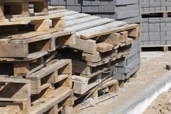 empty wooden pallets and new construction tiles Product Image 1