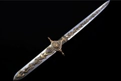 Antique ornate sword on black background Product Image 1