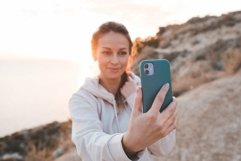 Happy young making selfie outdoors over sun light Product Image 1