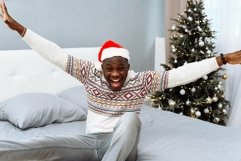 A cheerful man enjoys the holidays. Holiday, christmas Product Image 1
