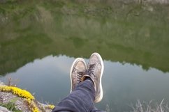 Feet above the lake water Product Image 1