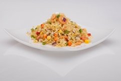 Salad in a white plate on a white background Product Image 1