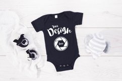 Black Bella Canvas 100B MockUp One Piece Flat Lay Bodysu Product Image 1