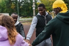 Runners build team spirit before training. Product Image 1