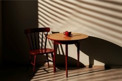 Warm sunlight casts shadows over a cozy table setting with a Product Image 1