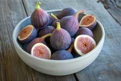 Fresh figs in a ceramic bowl on wooden table Product Image 1