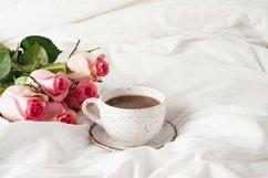 Morning breakfast in bed with coffee cup and pink roses Product Image 1