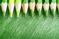 Green Crayon Pencils Background Wallpaper Product Image 1