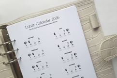 A5 moon phases tracker 2026 with illustrated crescent, gibbous and full moon graphics, UTC-based timing chart for all 12 monthly lunar cycles in printable PDF format.