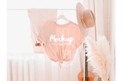 Heather Peach 3001 Bella Canvas Hanging Tshirt Mockup | Boho Product Image 1