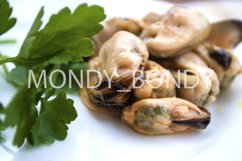 Mussels in oil and greens close-up, on a white plate Product Image 1