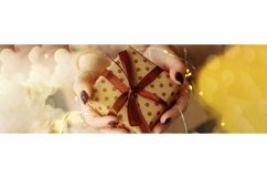 Hands hold and give a gift from craft brown packaging. Product Image 1