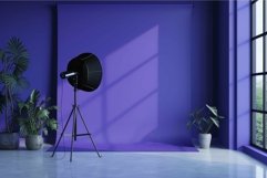 Modern photo studio setup with blue backdrop Product Image 1