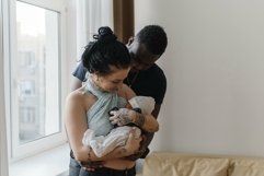 Caring for a mestizo baby. Multinational family Product Image 1