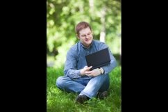 Businessman working in the park. Product Image 1