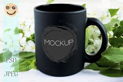 Black coffee mug mockup with apple blossom Product Image 1