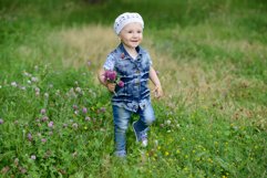 Cute baby girl on a walk in the Park Product Image 1