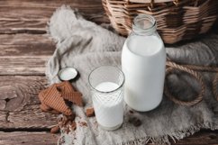 Oatmeal vegetarian milk on a wooden table Product Image 1