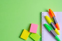 School and office supplies on office table, green background Product Image 1