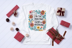 Colorful Boho floral Christian sublimation design featuring a bold white cross, hand-drawn wildflowers, and uplifting Bible verse &quot;In the Waiting, God is Working.&quot; Perfect for faith-based t-shirt printing, mugs, and wall art. This high-resolution PNG is i