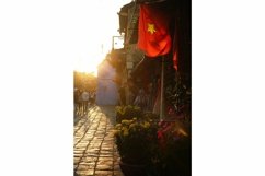 Touristic street in old historical town at the sunset. Product Image 1