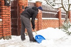 Young man remove snow Product Image 1