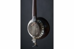 Part ancient Asian stringed musical instrument on black Product Image 1