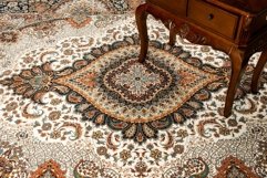Antique table on the decorated oriental carpet Product Image 1