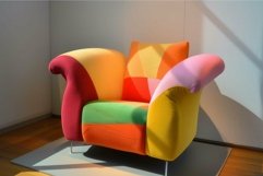 Vibrant multicolored modern armchair in sunlit room Product Image 1