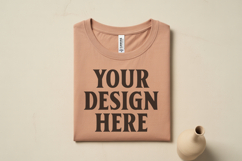 Heather Peach Folded Bella Canvas 3001 Flat Lay T-Shirt Product Image 1