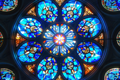 Vibrant Blue and Gold Rose Window Stained Glass Background Product Image 1